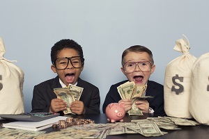 Young Children Excited and Holding Money